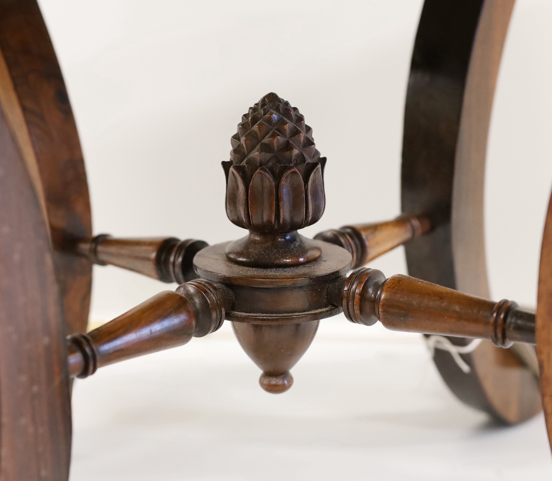 A Victorian rosewood dressing stool on scrolled supports, width 46cm, height 48cm
